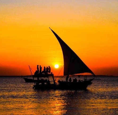 Sunset over a white sandy beach in Zanzibar