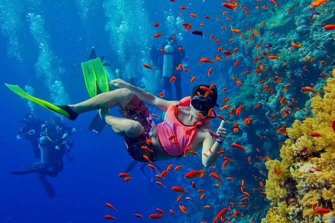 Snorkeling in the crystall-clear waters of Manemba hotel for the 5 Days Zanzibar Flying Package