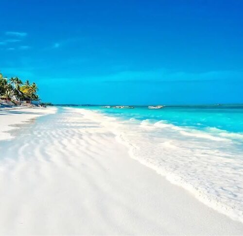 White sandy beach and turquoise waters in Zanzibar