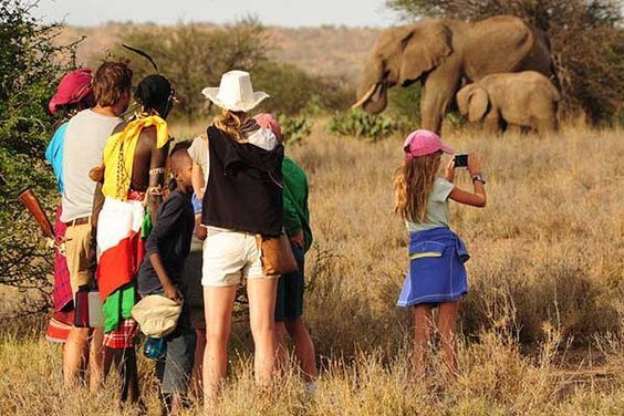 Kids enjoying wildlife safari in Kenya